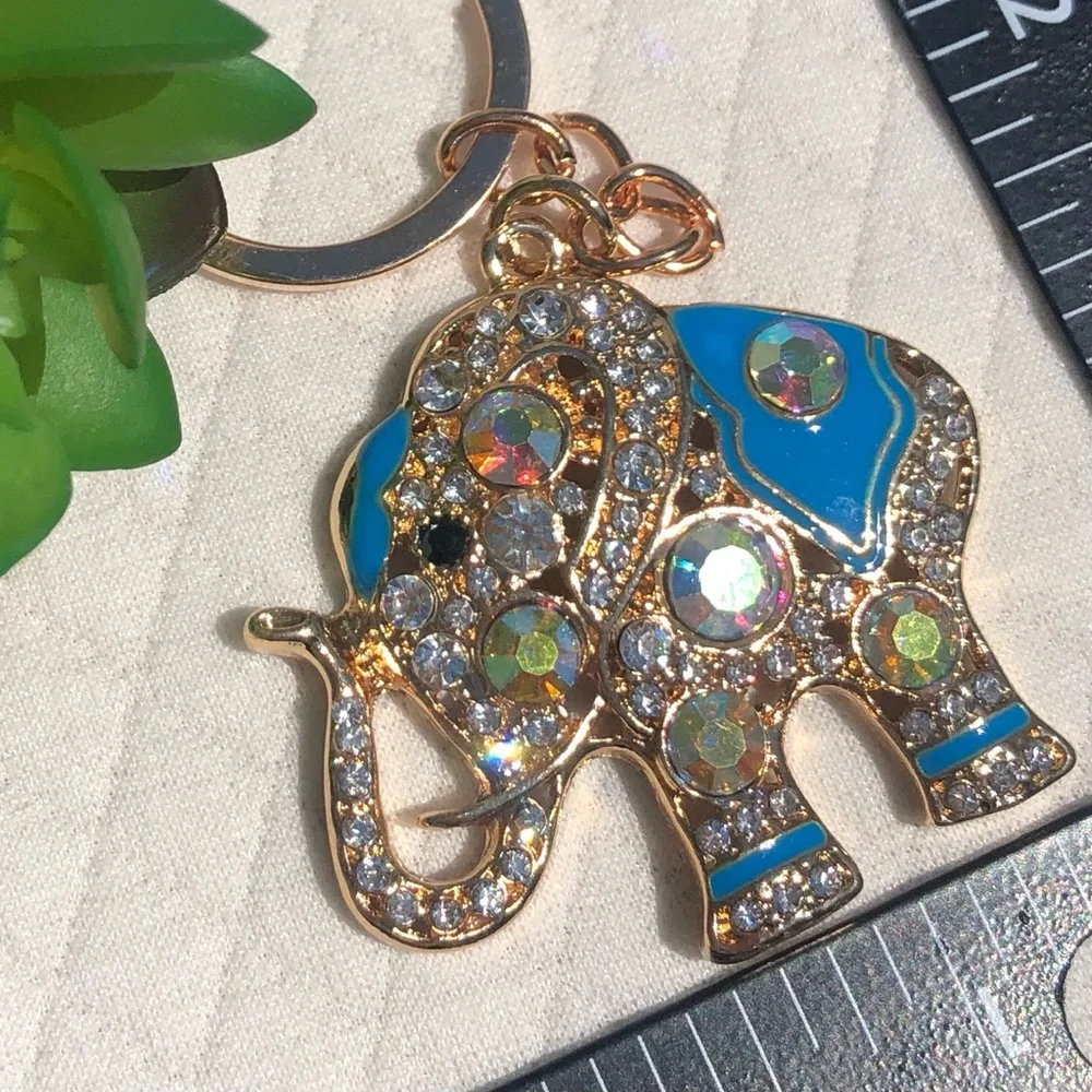 Beautiful lightweight sparkly elephant keychain 💙🐘🤍 - Picture 3 of 7